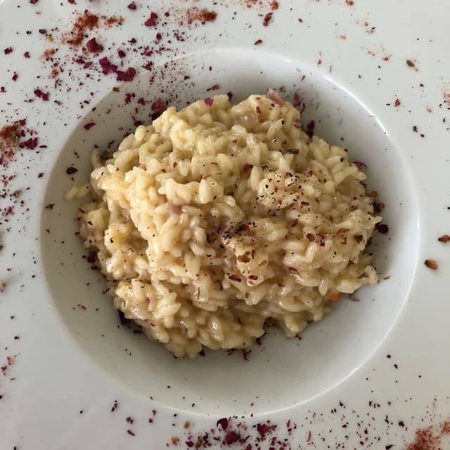 Photo of the dish “Risotto mantecato alle rose rosse e bollicine”