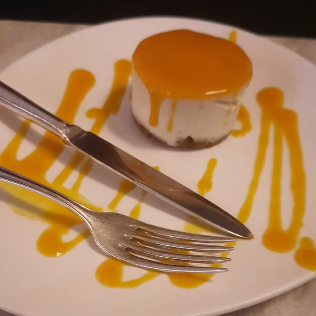 菜肴“Mango cheesecake”的照片