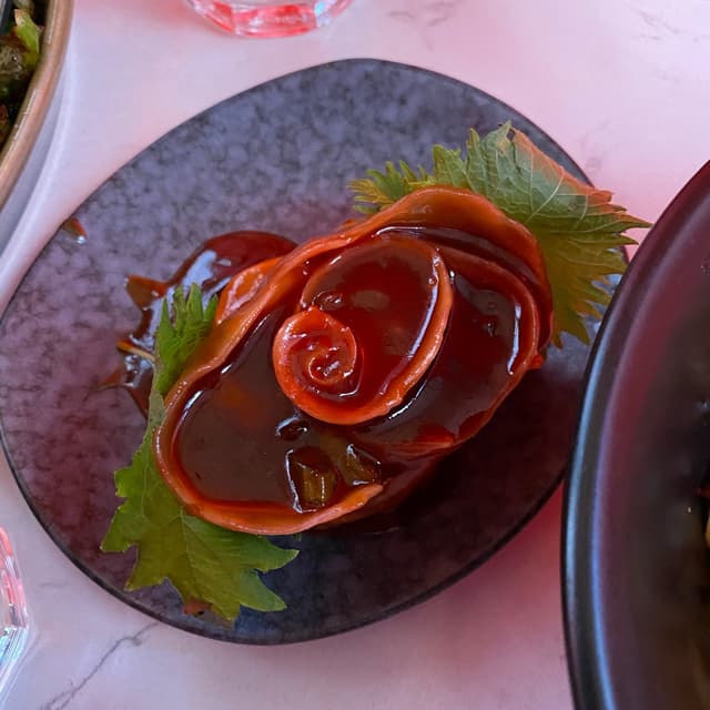 菜肴“Kung Pao Shiitake Rose Dumpling”的照片