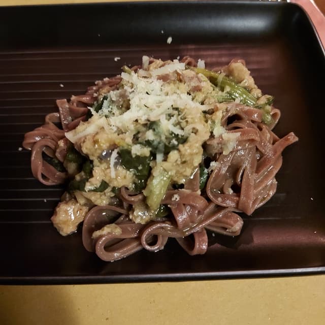 Photo of the dish “Tagliatelle al cacao con ragù di soia, verdure e grattugiato vegetale ai ceci”