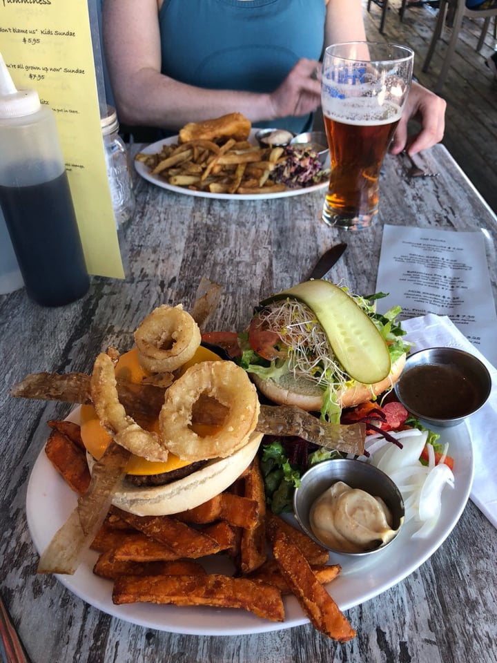 review photo of Fish on Fifth The Beyond beef burger with, vegan cheese, bacon bun and mayo. This restaurant has over 25 vegan options on their menu! Two thumbs up! shared by @taylorwinfrey on 15 Jul 2018 - review