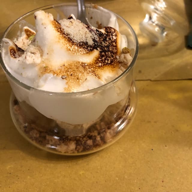 Photo of the dish “Delizia di Crema Di Acquaba Al Burro Di Arachidi Con Cuore Di “Nutella”, Arachidi Saltate E Crumble Croccante”
