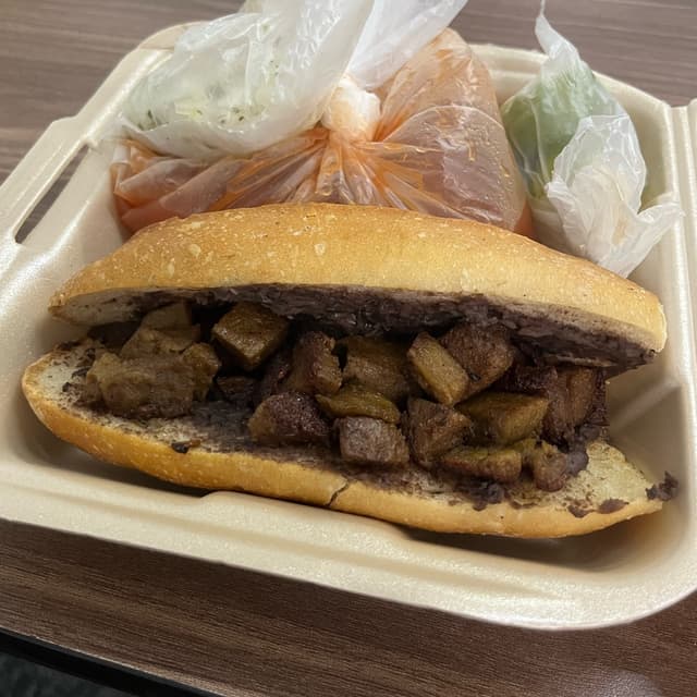 Foto do prato “Torta ahogada”