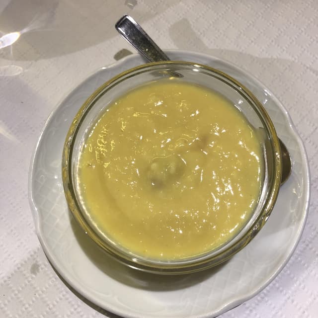 Photo of the dish “Crema de coco y pasas”