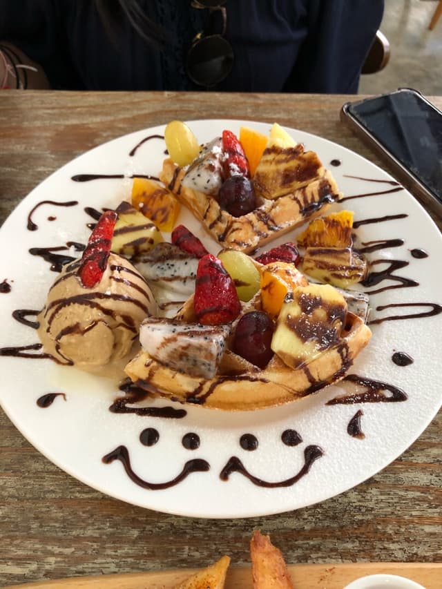 Photo of the dish “Waffle with Fresh Fruit and Happy Cow Ice Cream”