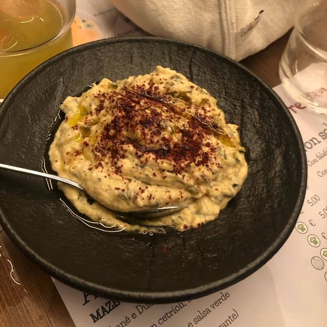 Foto do prato “Crema di zucchine in salsa tahina”