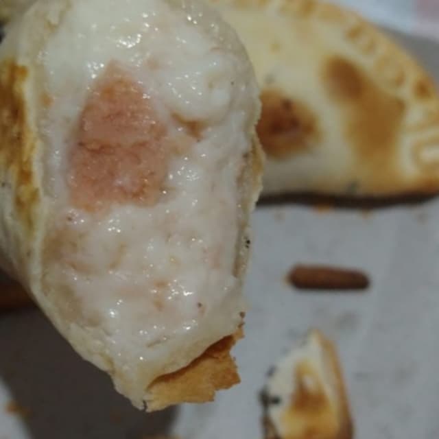 菜肴“Empanada jamón y queso”的照片