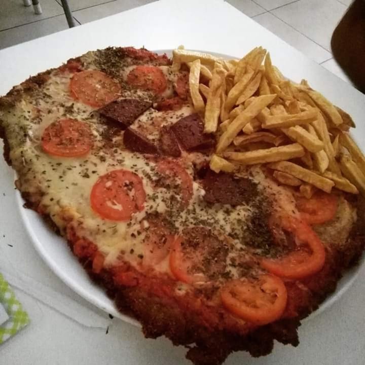 photo of Loving Hut Microcentro Milanesa napolitana con papas fritas shared by @longnajamonster on  29 Aug 2019 - review