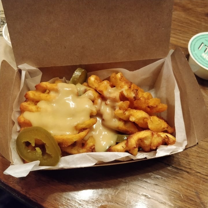 review photo of LEON Cheezy loaded fries shared by @ecofriendlyvegangeek on 10 Dec 2022 - review