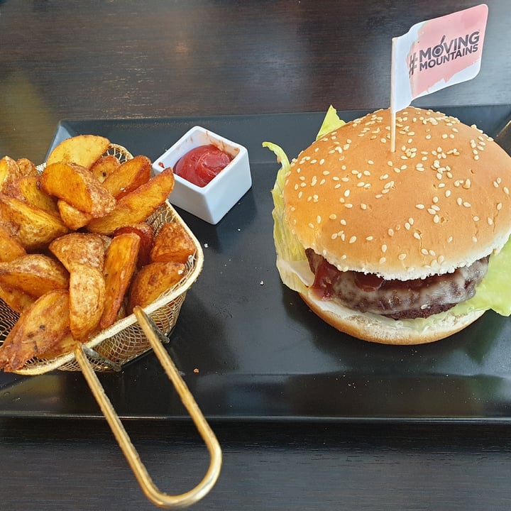 photo of Loving Hut Moving Mountains Burger with spicy potatoes shared by @janaplantpowered on  18 Jul 2020 - review