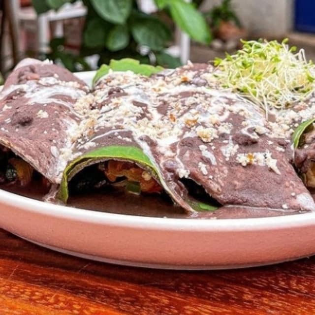 Photo of the dish “enfrijoladas”