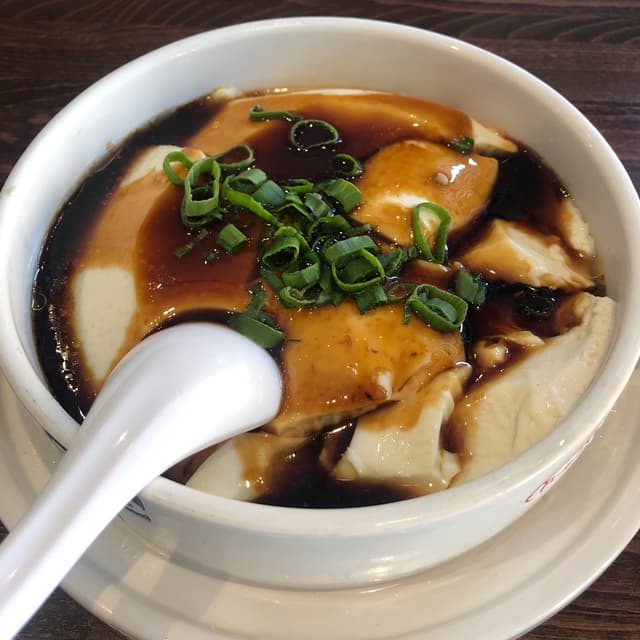 Photo of the dish “House-made Silken Tofu In A Savoury Sauce”