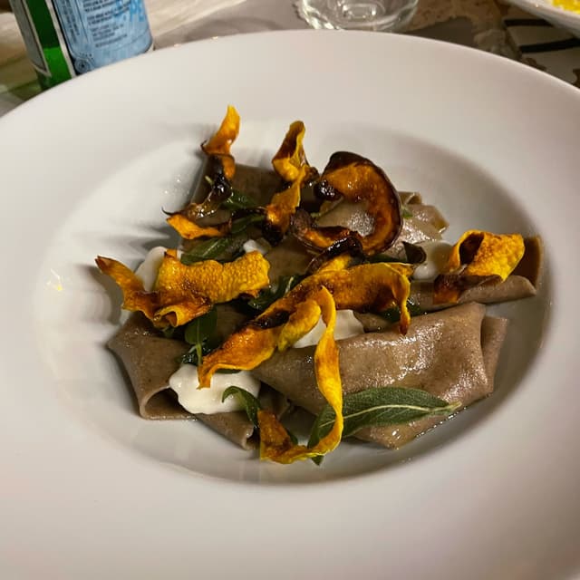 Photo of the dish “Stracci Di Pasta Al Grano Arso, Zucca Confit E Pesto Di Salvia”