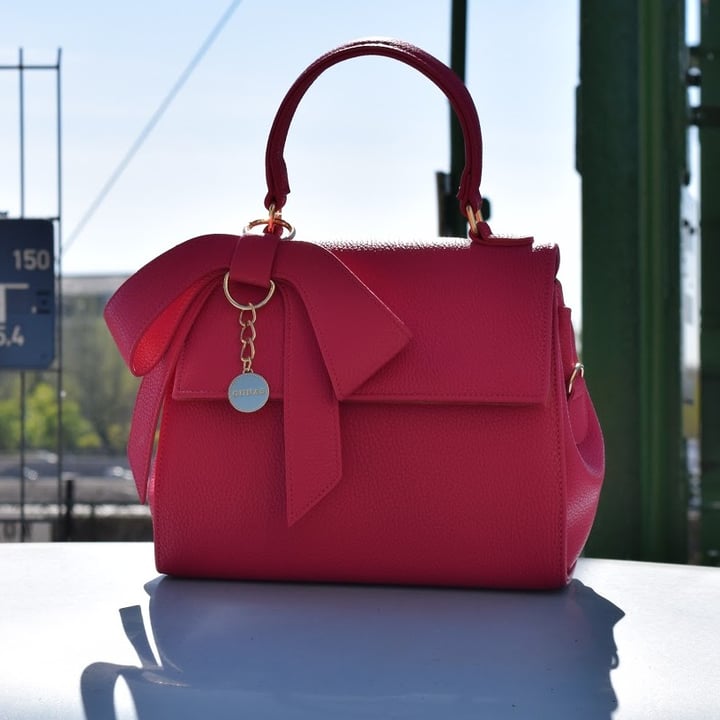 Gunas purse sales