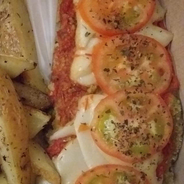 Photo of the dish “Milanesa A La Napolitana”