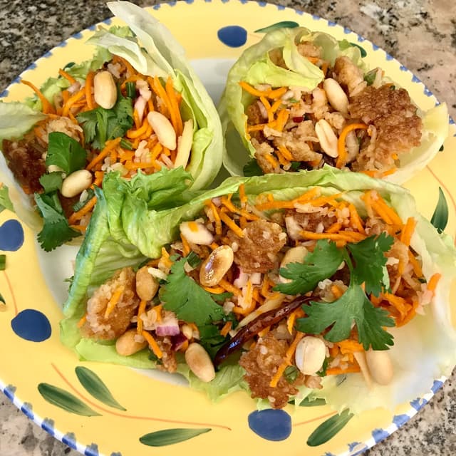 Photo of the dish “Nam Kao Tod”