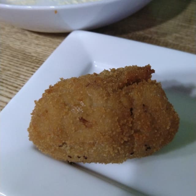 菜肴“Croquetas de setas al ajillo”的照片