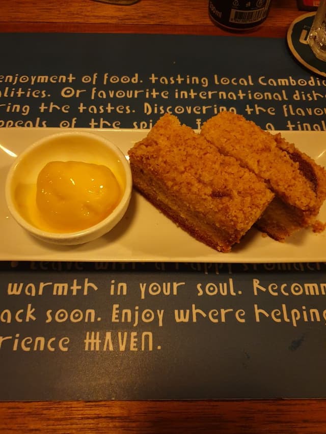 Photo du plat “Banana Crumble with Mango Sorbet”