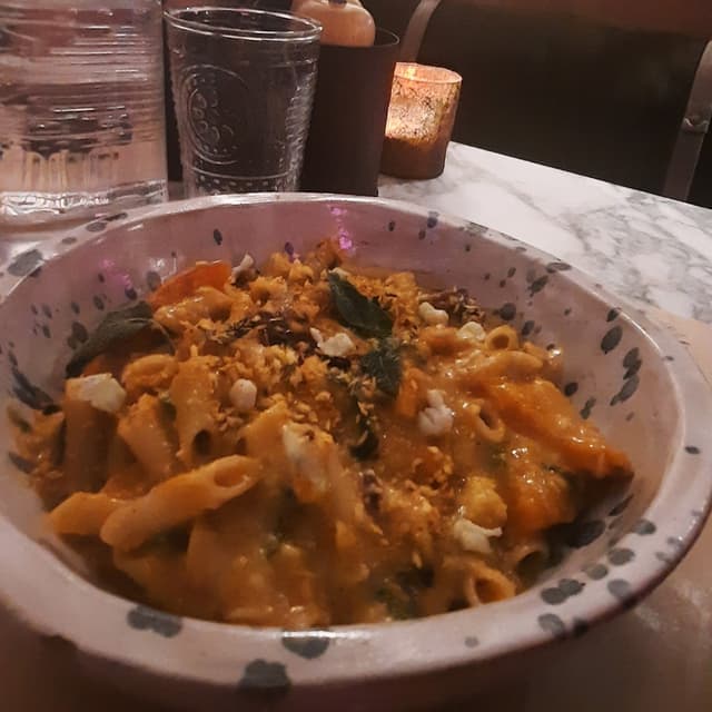 菜肴“Pasta With Pumpkin, Nuts, And Vegan Cheese”的照片