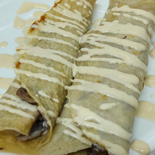 Photo of the dish “Crêpes De Crema De Champignons”