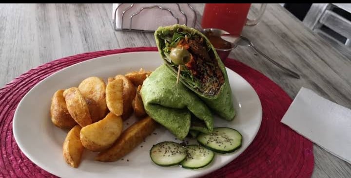 photo of Ahimsa Cocina Consciente Burrito De Chochinita Pibil Y Falafel shared by @phoenixkuiper on  19 Dec 2019 - review