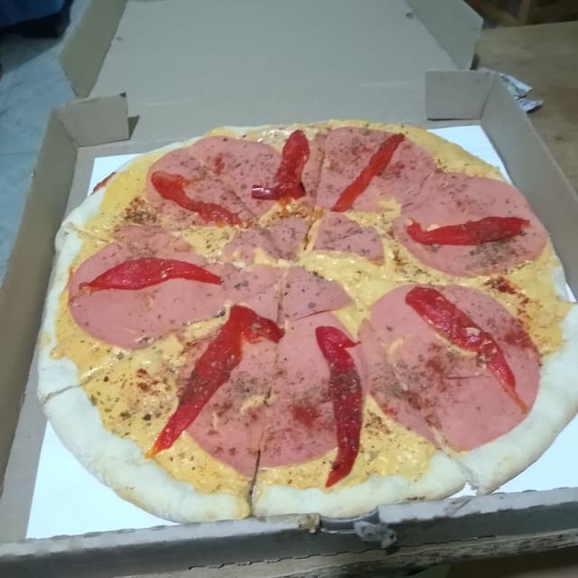 Foto del piatto “Pizza Muzzalmendra Con Jamon Y Morron”
