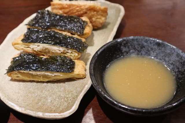 Photo of the dish “Tofu Sheet with Needle Mushroom Roll and Nori”