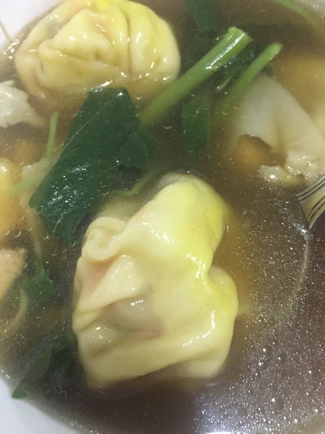 Photo of the dish “House-Made Dumpling Soup”