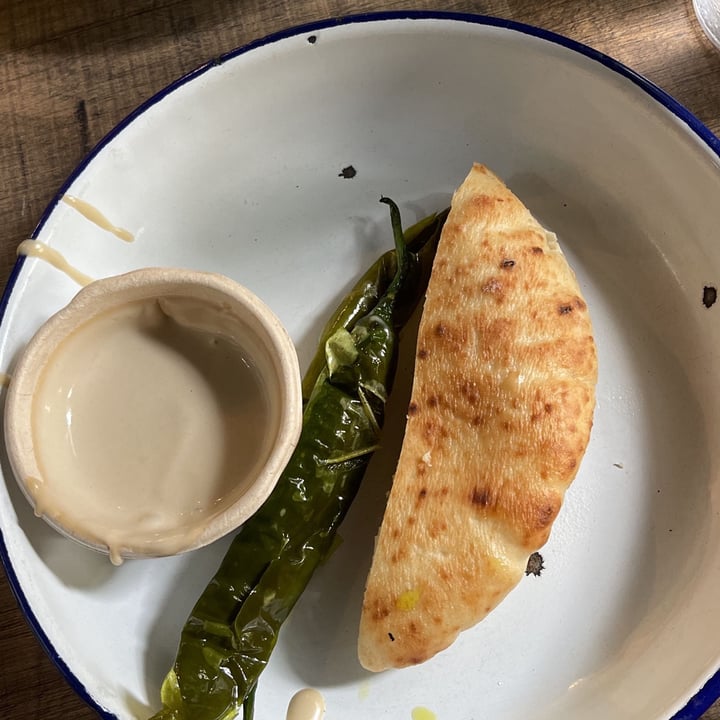 photo of Miznon Singapore Hot Damn It's FREE FLOW PITA & TAHINI shared by @melodyhe on  05 Oct 2022 - review