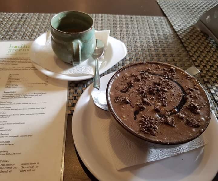 photo of Bodhi Greens - The Organic Vegan Café Tea  and cocoa smoothie bowl shared by @jagritikaushik on  29 Feb 2020 - review