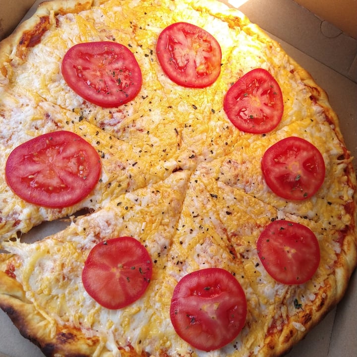 review photo of Veggino's Pizza Pizza margarita shared by @marcelaram1 on 26 Dec 2020 - review