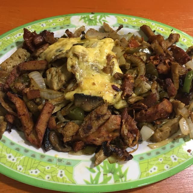 Photo of the dish “Alambre con queso”