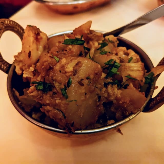 Foto do prato “Aloo Gobhi”
