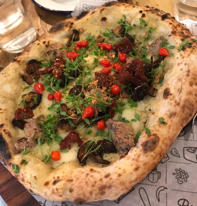 Photo of the dish “The Roquito Pizza”