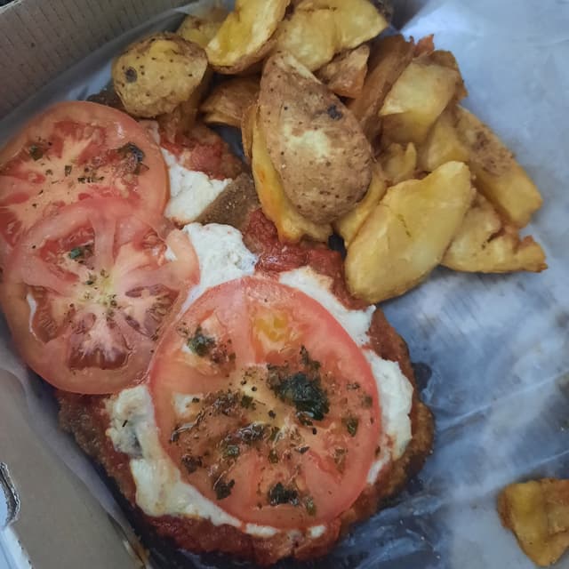 Photo of the dish “Milanesa napolitana”