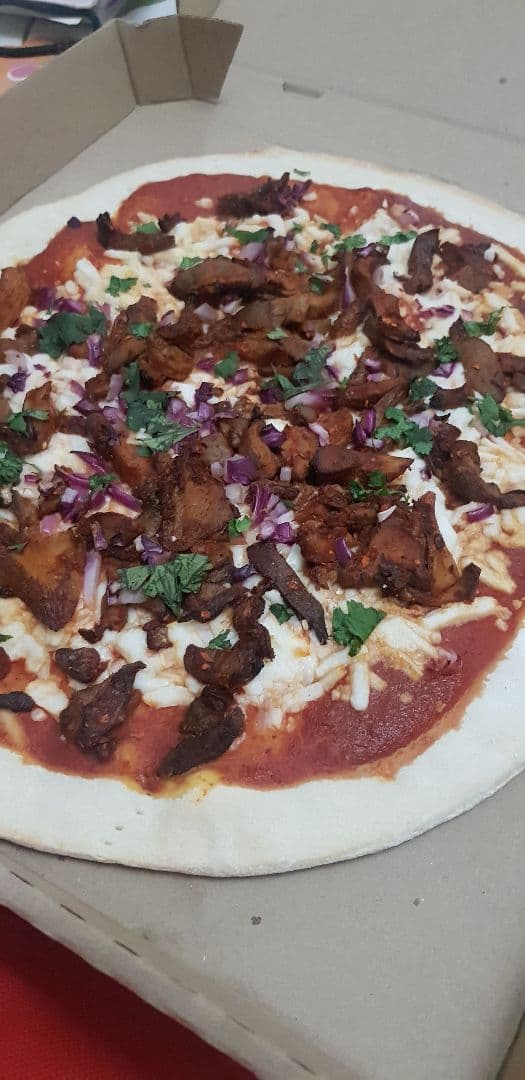 菜肴“Pizza de setas al pastor”的照片