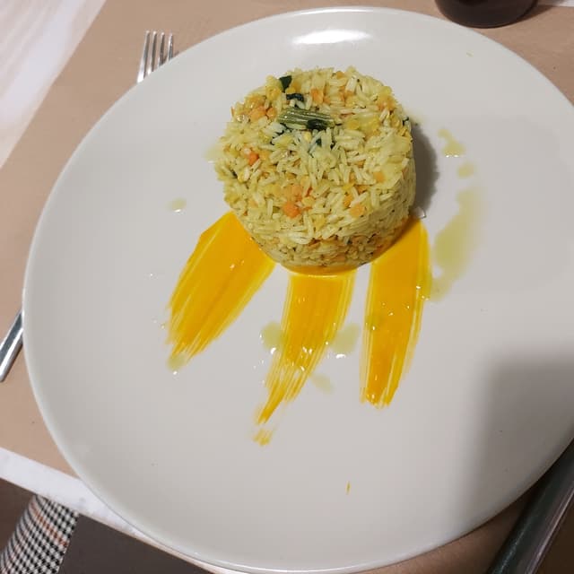 Photo of the dish “Riso al curry, latte di cocco e lenticchie”