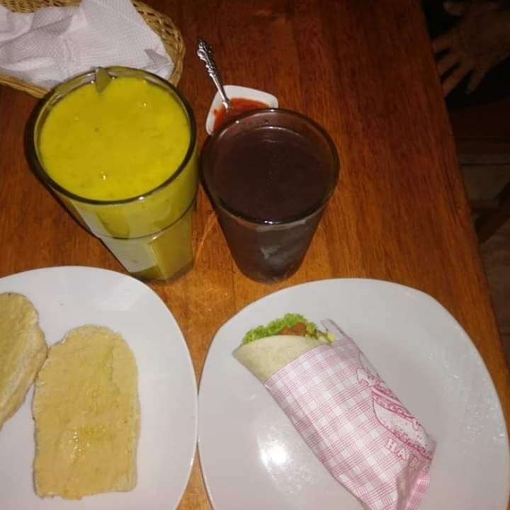 photo of "La Semilla" - Cafetería - Pastelería - Restaurant - Mirador Wraps Vegano, refresco de Acai, licuado de mango con lucuma y pan con Hummus shared by @andremperatriz on  27 Dec 2019 - review
