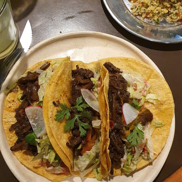 Photo of the dish “tacos de girgolas”
