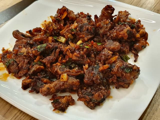 Photo of the dish “Mushroom Manchurian (Dry)”