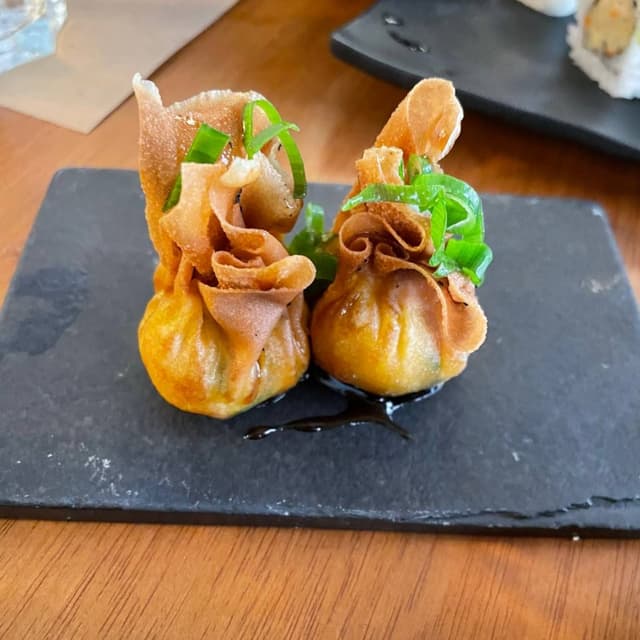 Photo of the dish “Trouxinha de abóbora cabotiá com nirá”