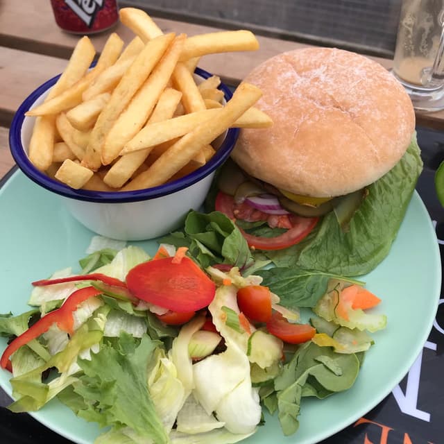 「Burger and chips, with side salad」の料理の写真