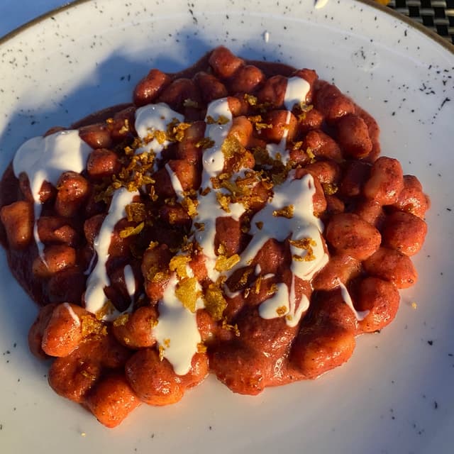 「Gnocchi rosa con stracchino」の料理の写真