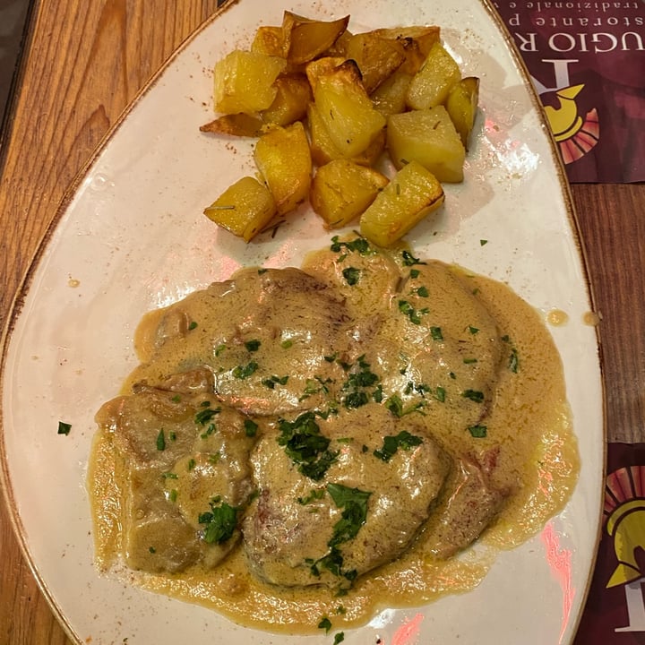 photo of Rifugio Romano Scaloppina di seitain al limone con patate al forno shared by @andrius on  18 Feb 2022 - review