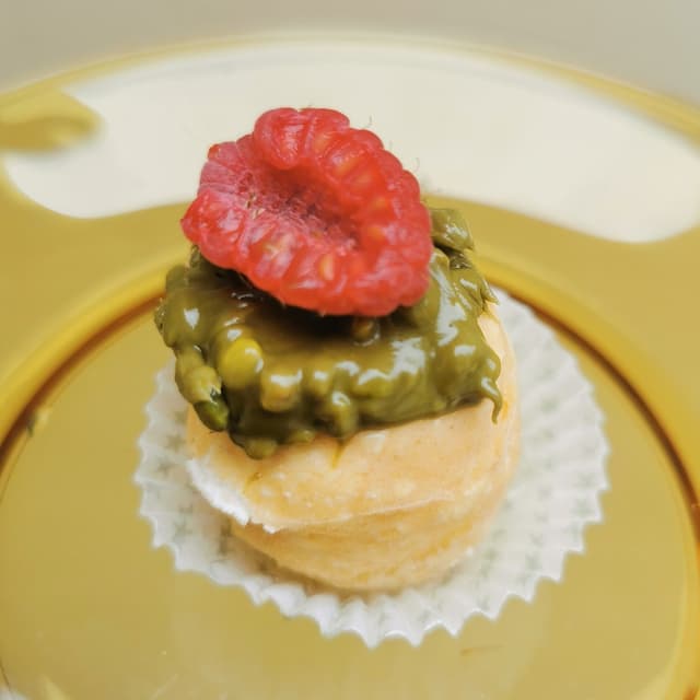 Foto del plato “Pasticcino pistacchio E Lampone”