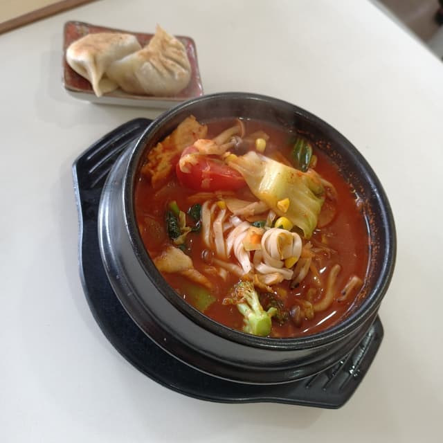 Photo of the dish “Kimchi Ramen with Gyoza”