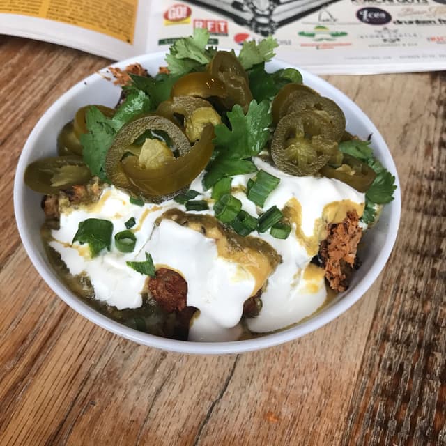 Foto do prato “Loaded Nacho Tater Tots”