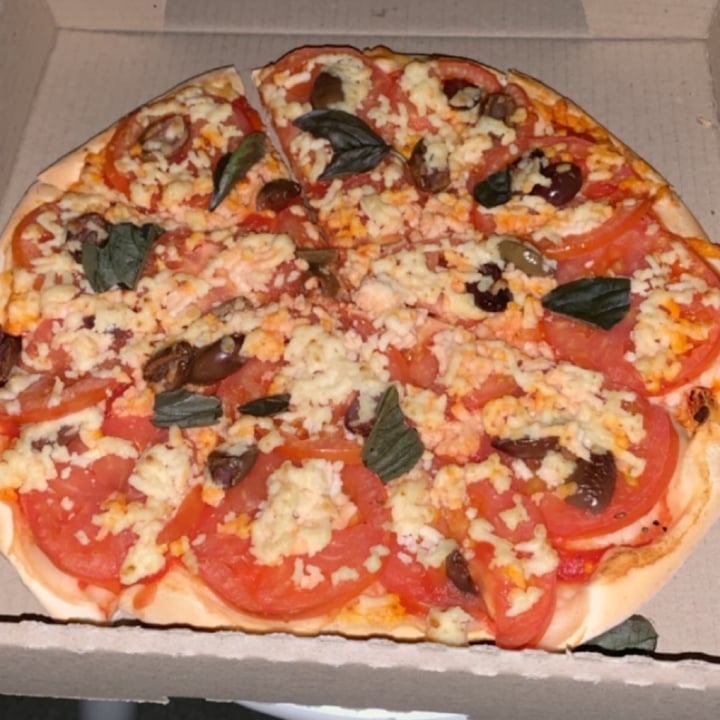 review photo of Crust Gourmet Pizza Bar Margarita Pizza shared by @vmuter on 22 Jul 2020 - review