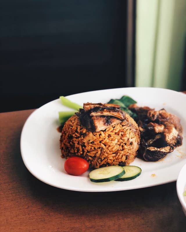 Foto do prato “Duck Rice”