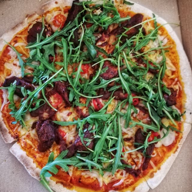 Photo of the dish “Rib & Rocket Pizza”